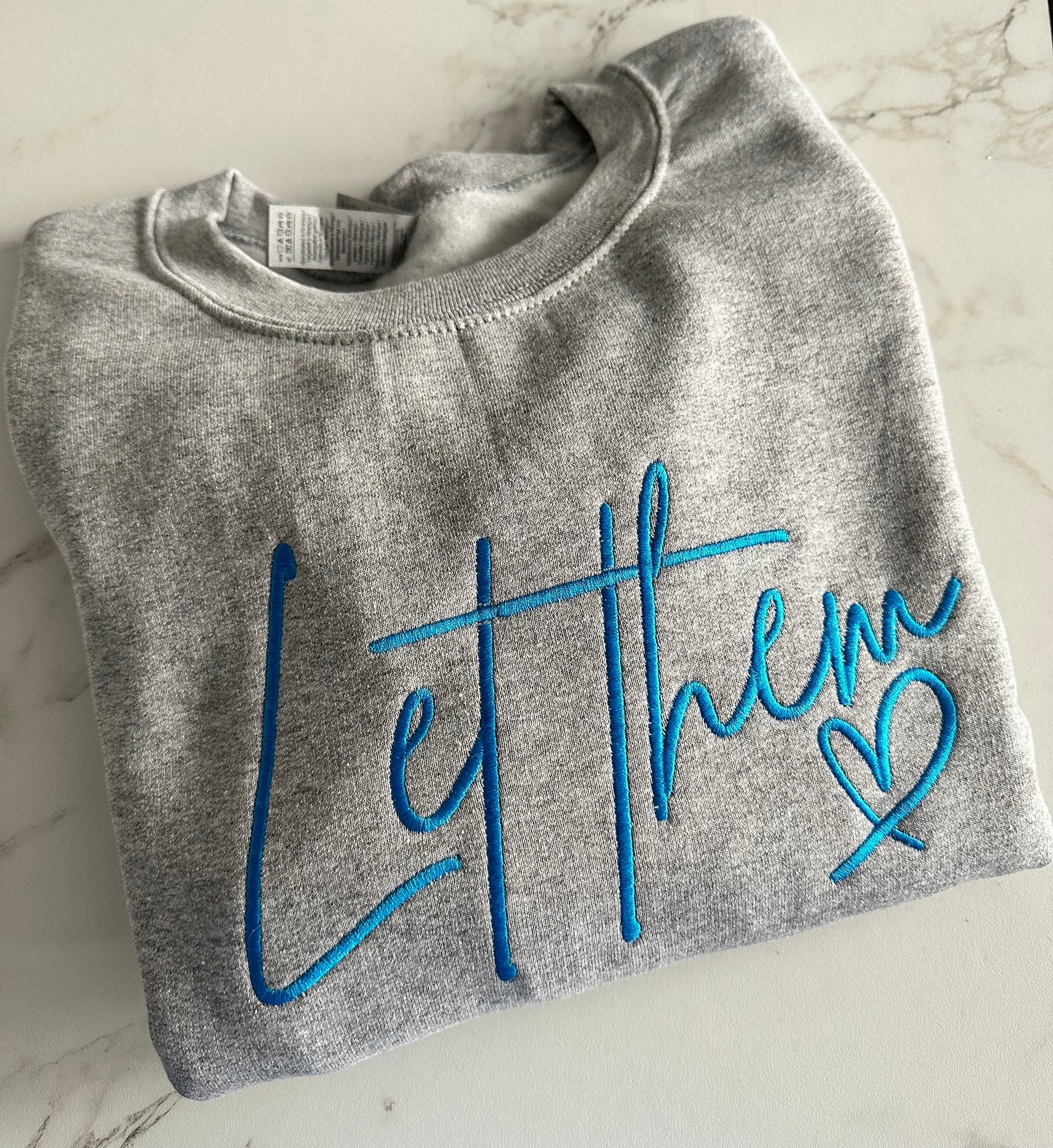 Let Them Embroidered Sweatshirt